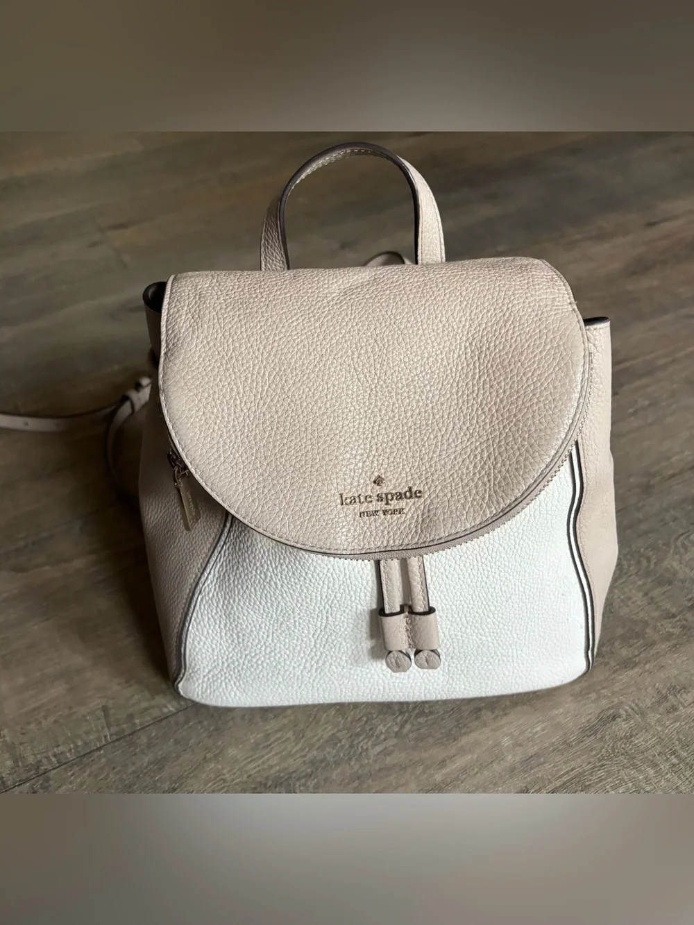 Kate Spade women’s Leila Medium Flap Backpack beige cream pebbled leather purse